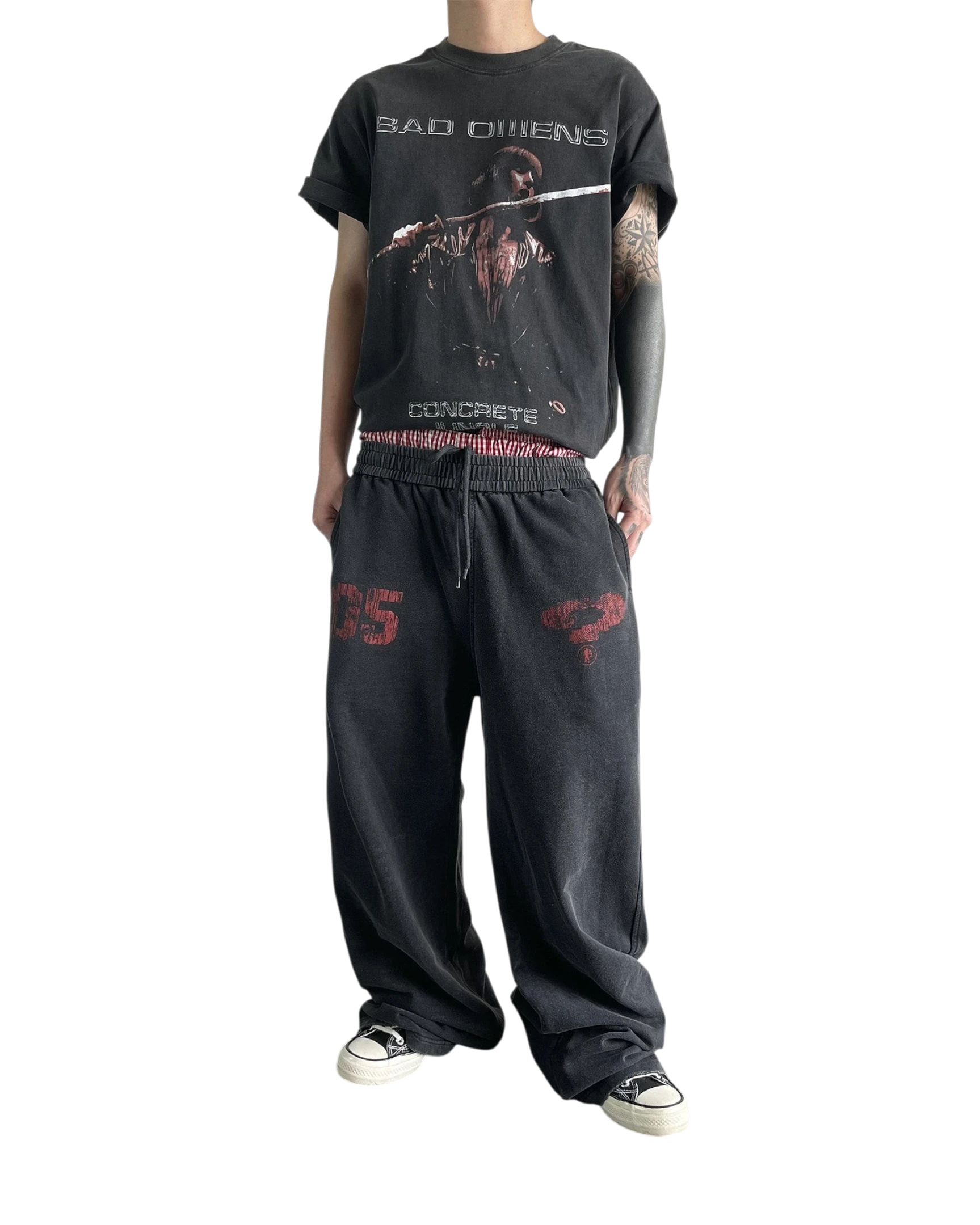 Vicious baggy heavyweight sweatpants in washed black with distressed red print, featuring a loose straight-leg fit.