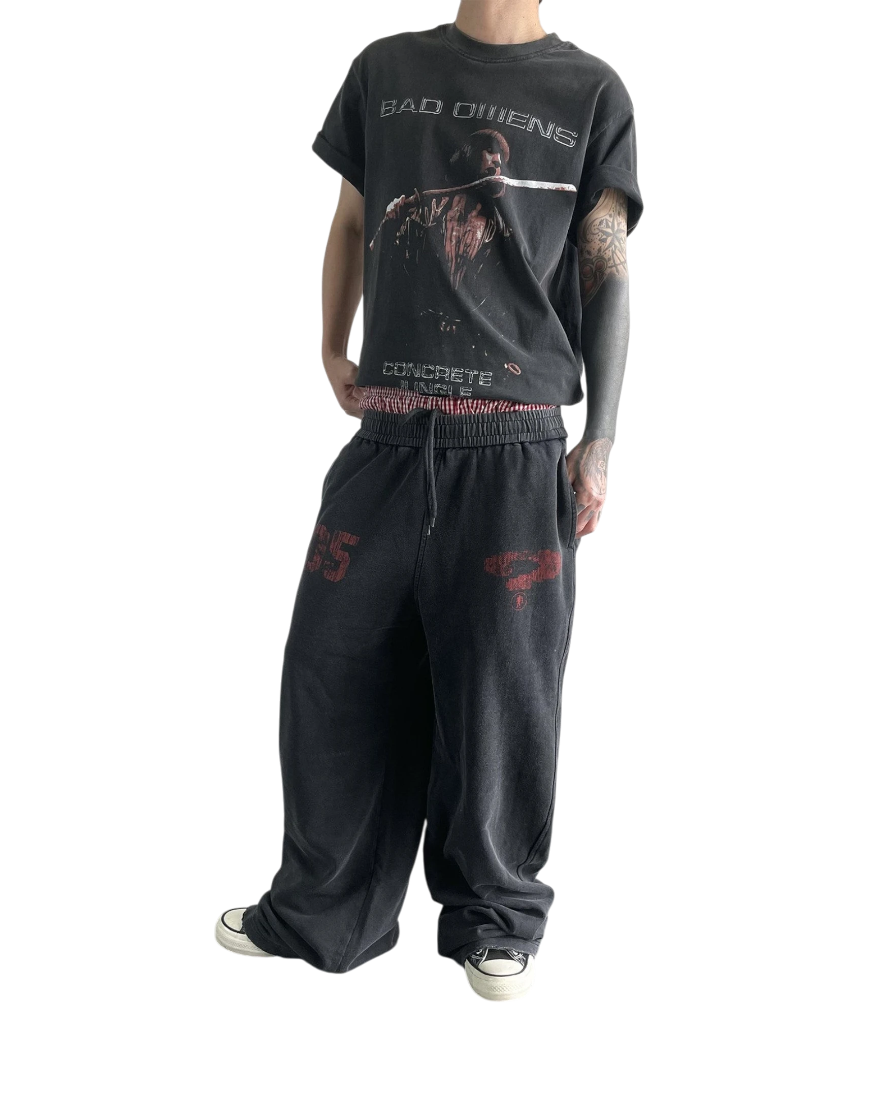 Vicious baggy heavyweight sweatpants in washed black with distressed red graphic prints and a loose straight-leg fit