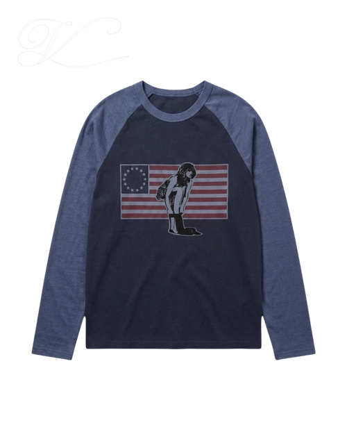 Vicious Betsy raglan long-sleeve shirt in navy and blue cotton with a retro American flag graphic print.