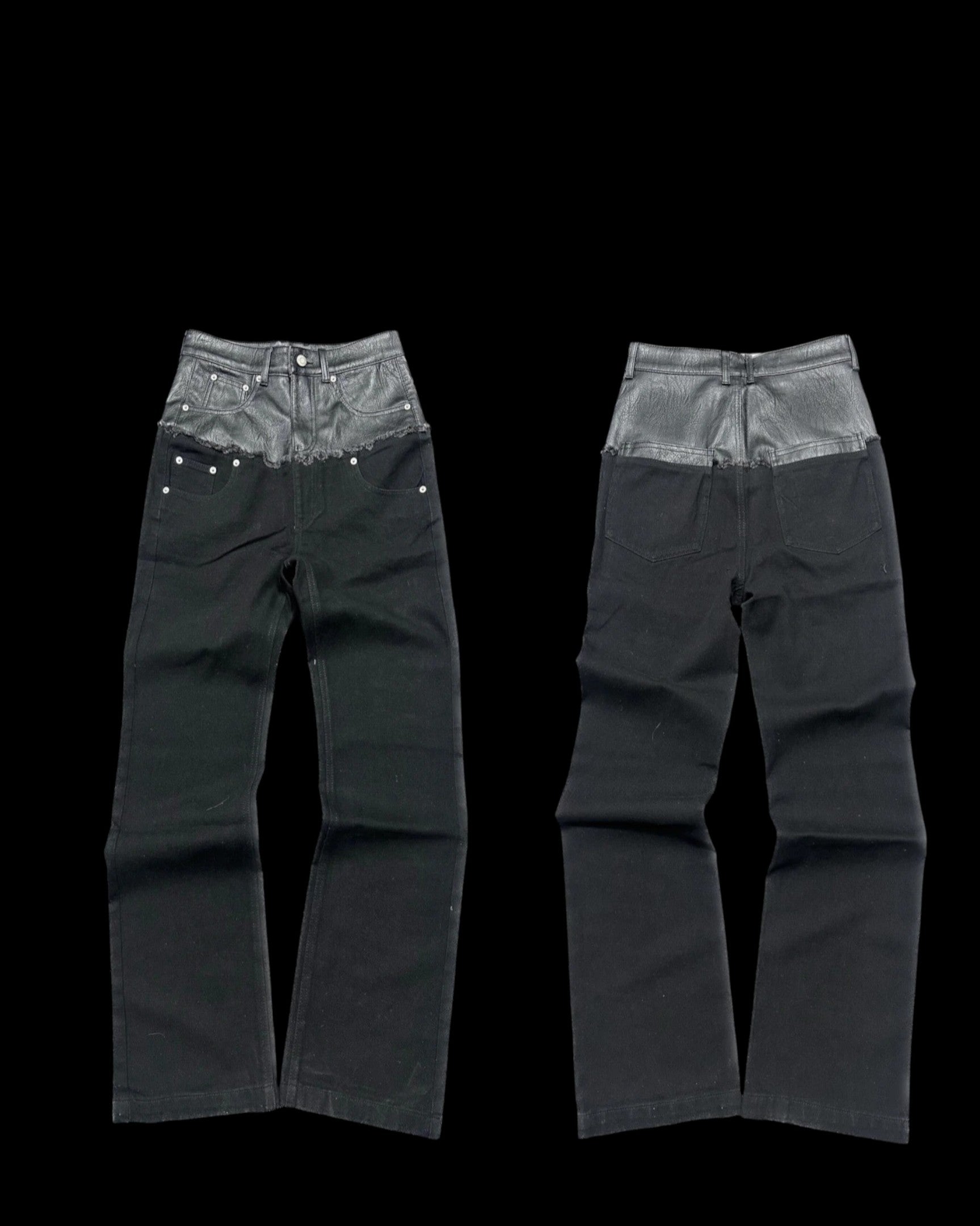 Vicious black denim jeans with a contrasting grey leather-look waist panel and raw edge detail, front and back view.
