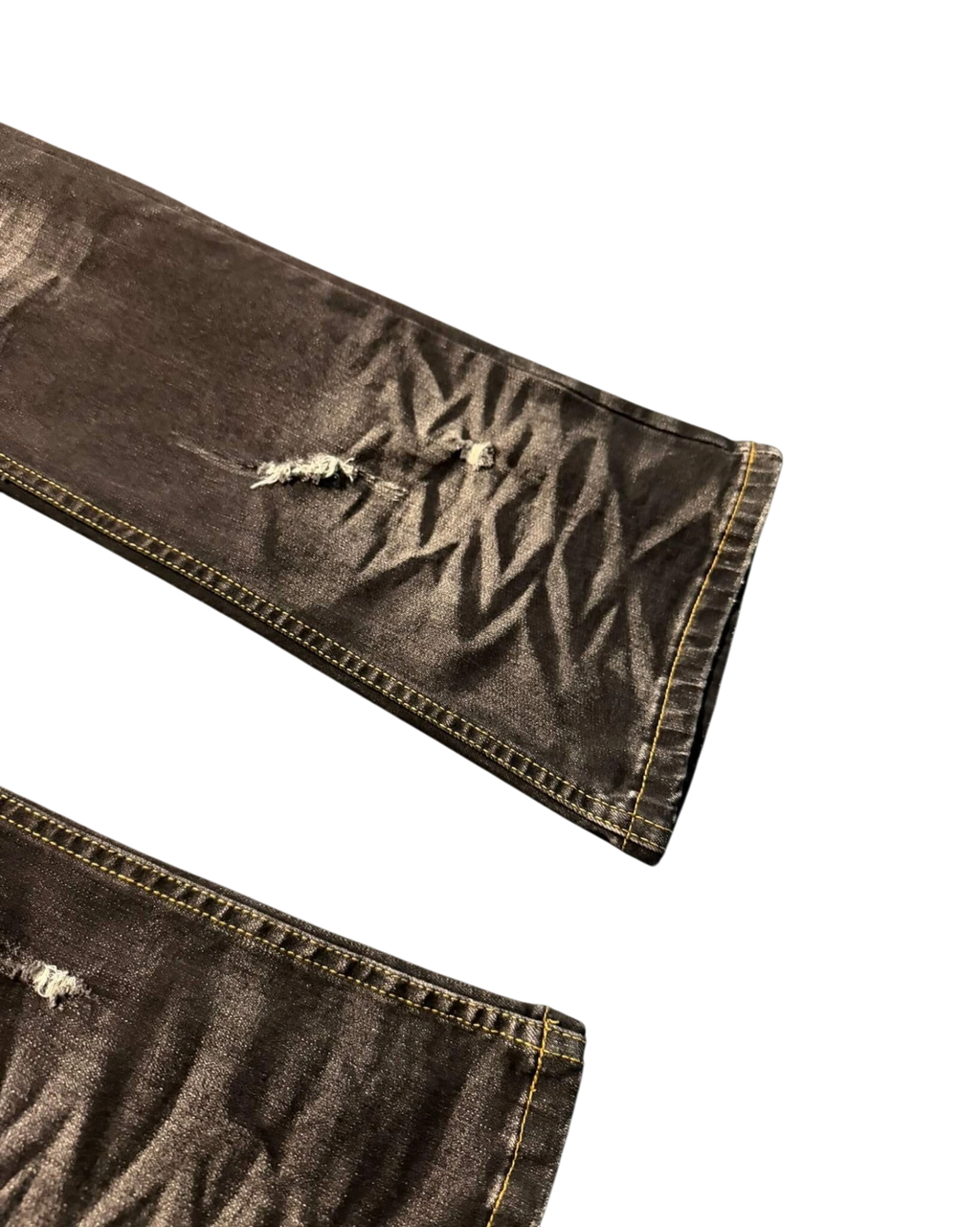 Vicious Cracked Jeans in dark stretch denim with distressed elements and whiskering details on the legs.