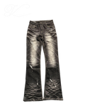 Vicious Cracked Jeans in black stretch denim with distressed details, straight fit, and flared leg design.