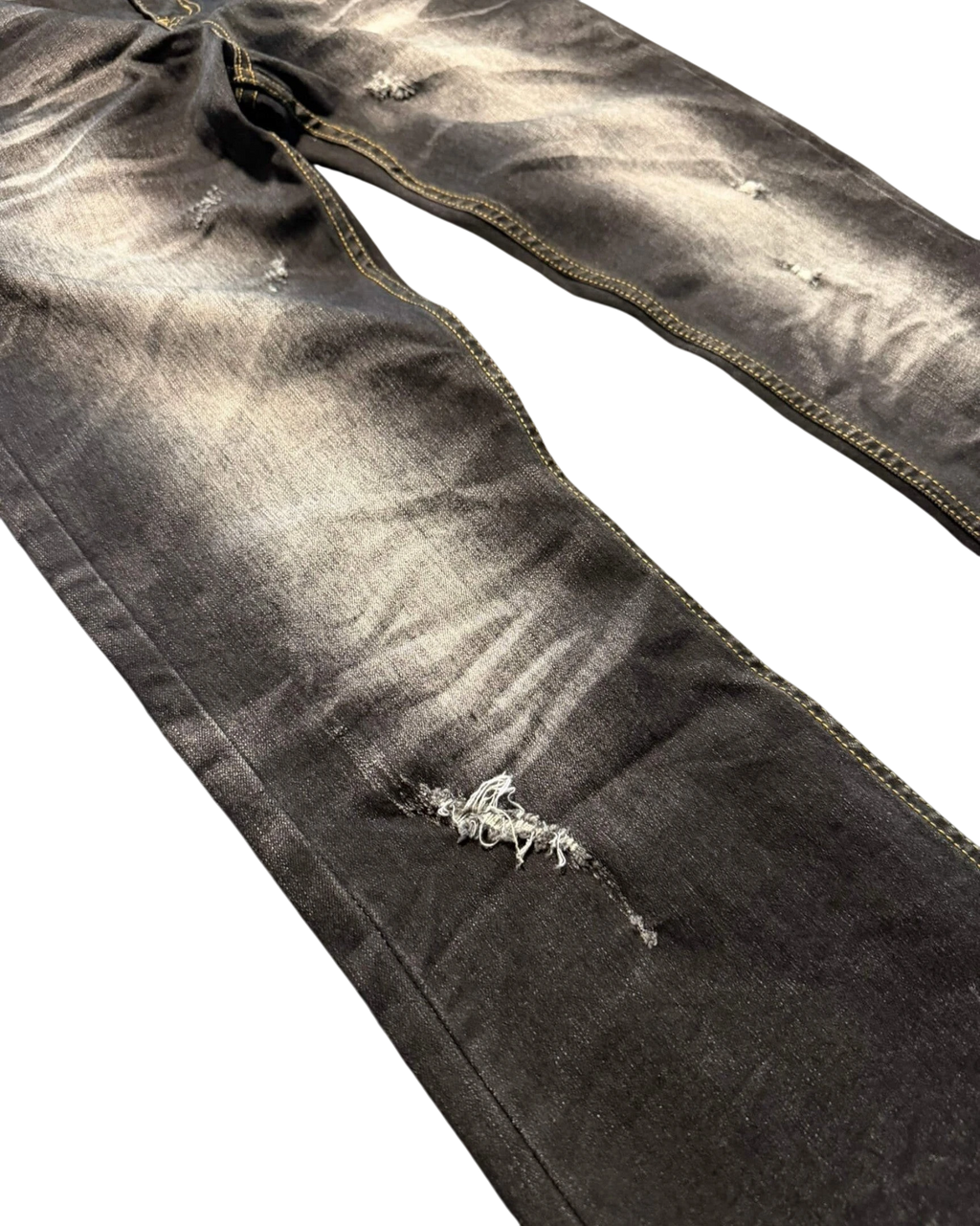 Vicious Cracked Jeans in black stretch denim with distressed details, whiskering, and a straight leg fit.
