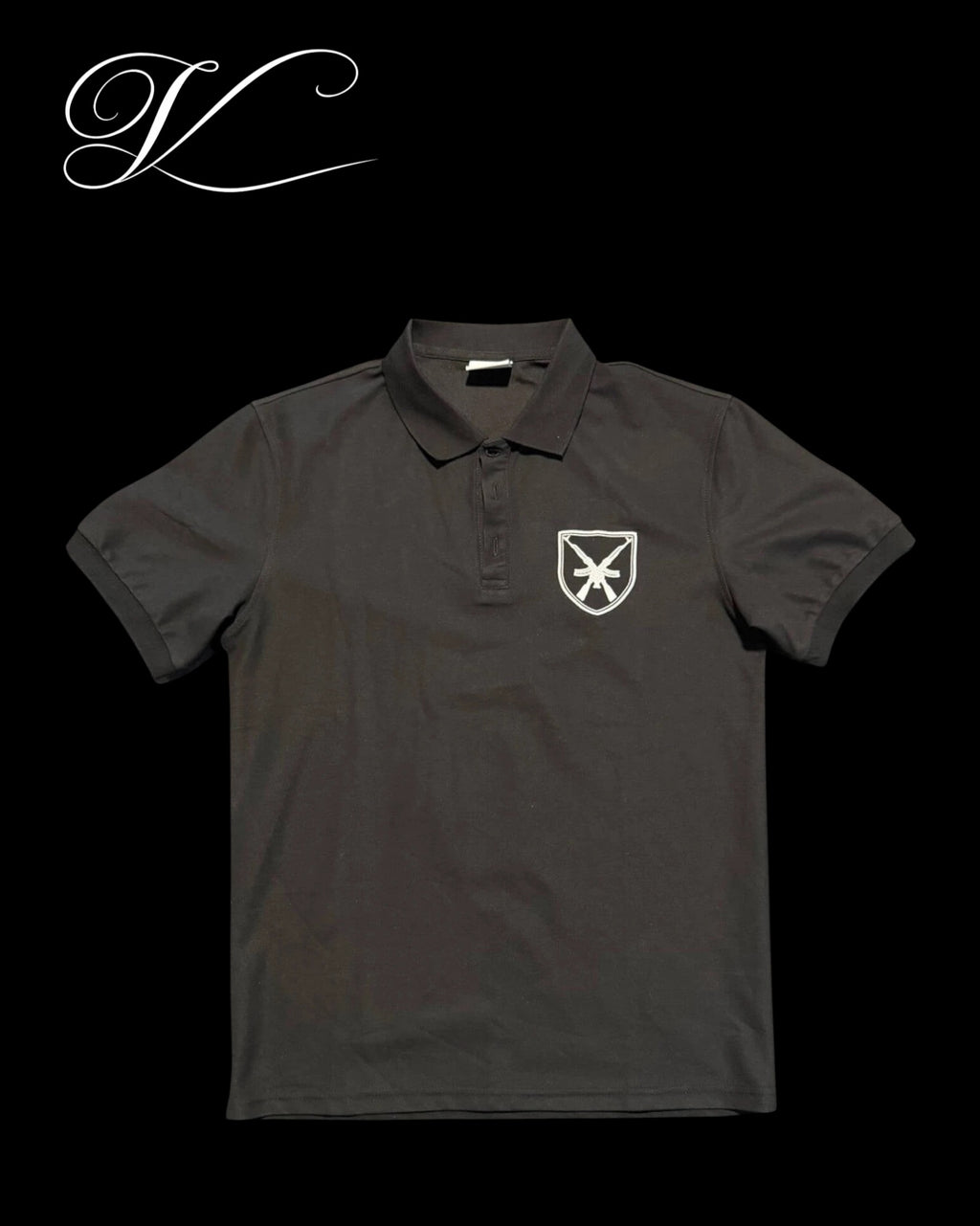 Vicious Crest Polo in black cotton blend with a white embroidered crest and weapon motif on the chest.