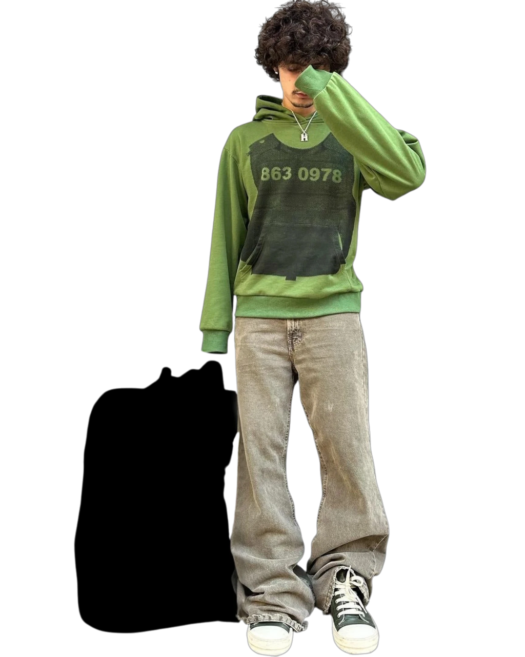 Vicious green hoodie with black body armor graphic and number print worn by a model with baggy grey jeans