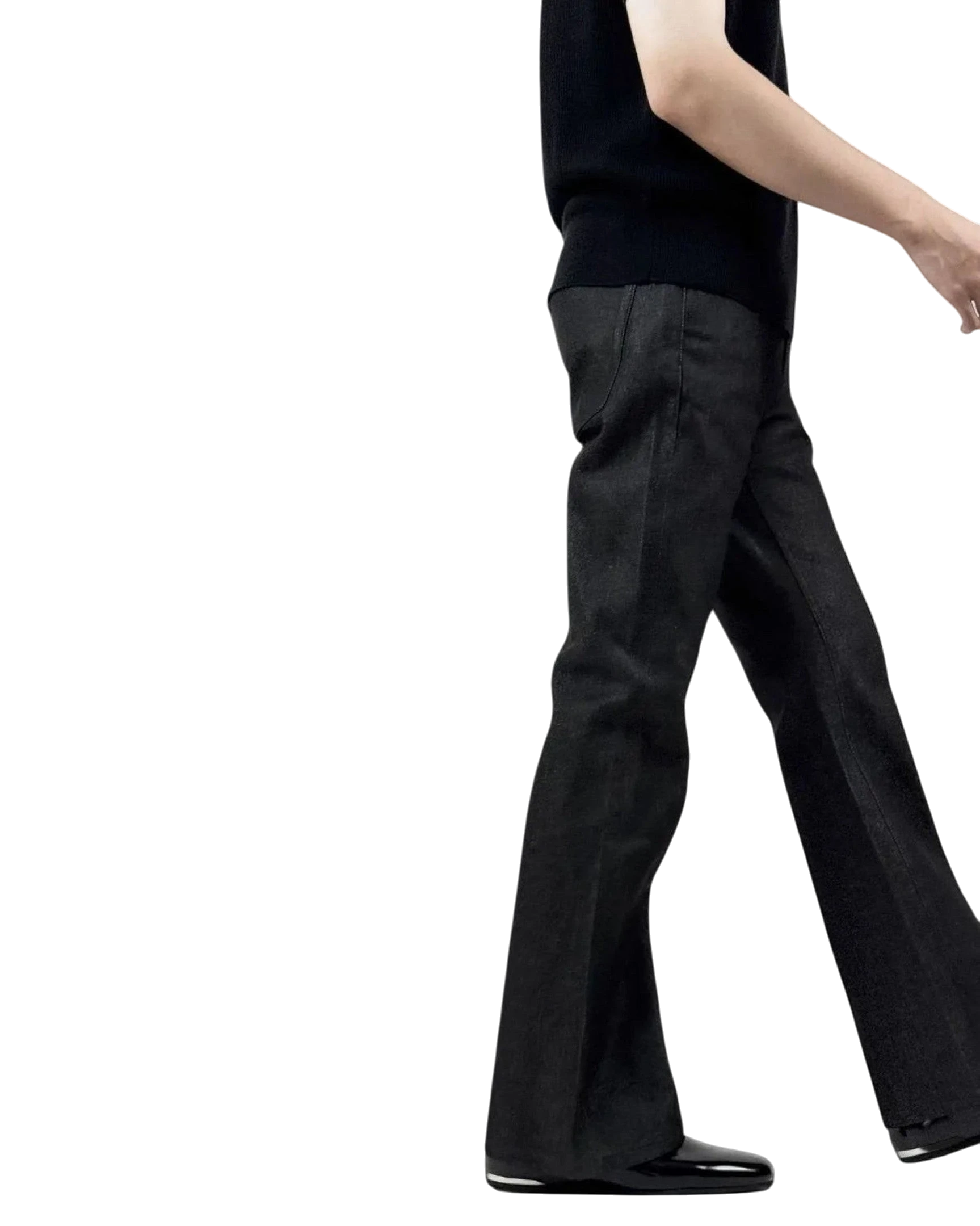 Vicious raw denim bootcut jeans in dark wash with high-rise fit and tonal stitching worn by a model.