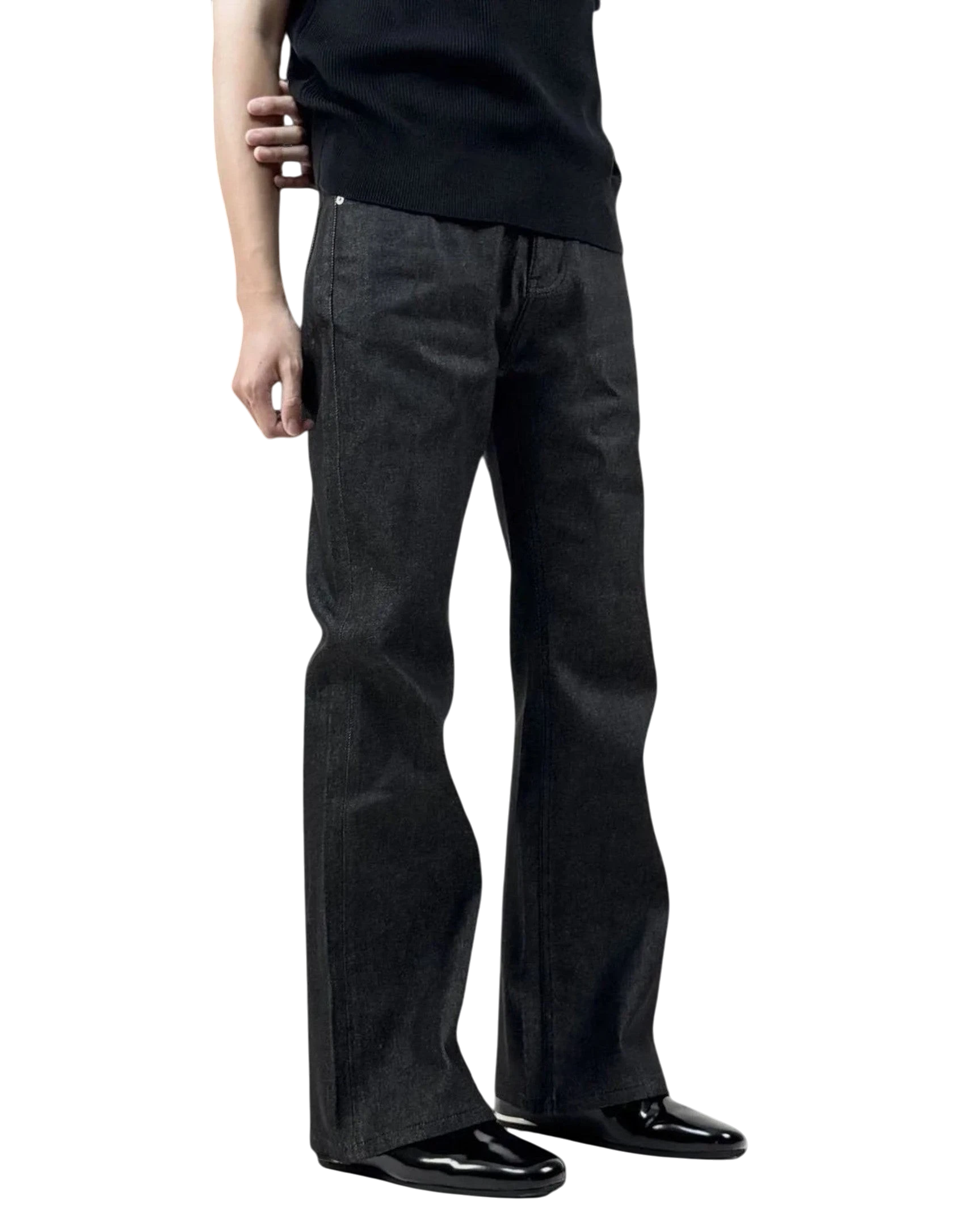 Vicious raw denim high-rise bootcut jeans in dark wash with tonal stitching and silver hardware on a model.
