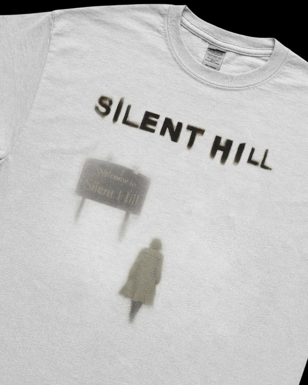 Vicious grey crew neck short sleeve t-shirt featuring a retro Silent Hill graphic print with a figure and sign.