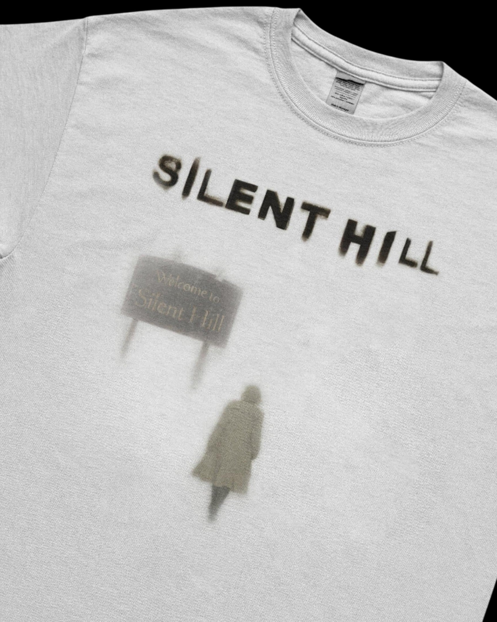 Vicious grey crew neck short sleeve t-shirt featuring a retro Silent Hill graphic print with a figure and sign.