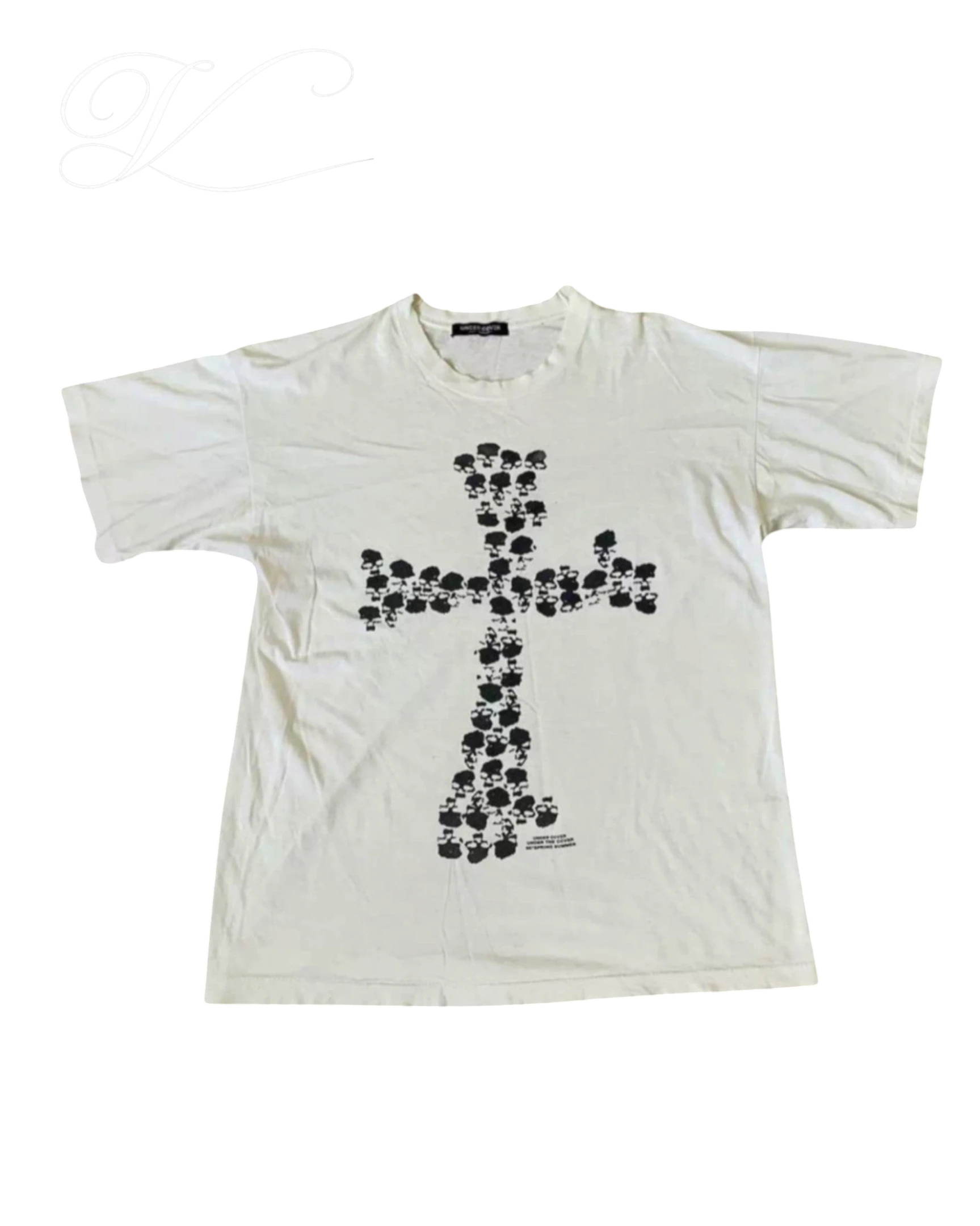 Vicious Skull Cross Tee in white cotton with a black graphic cross made of skulls, featuring a crew neck design.