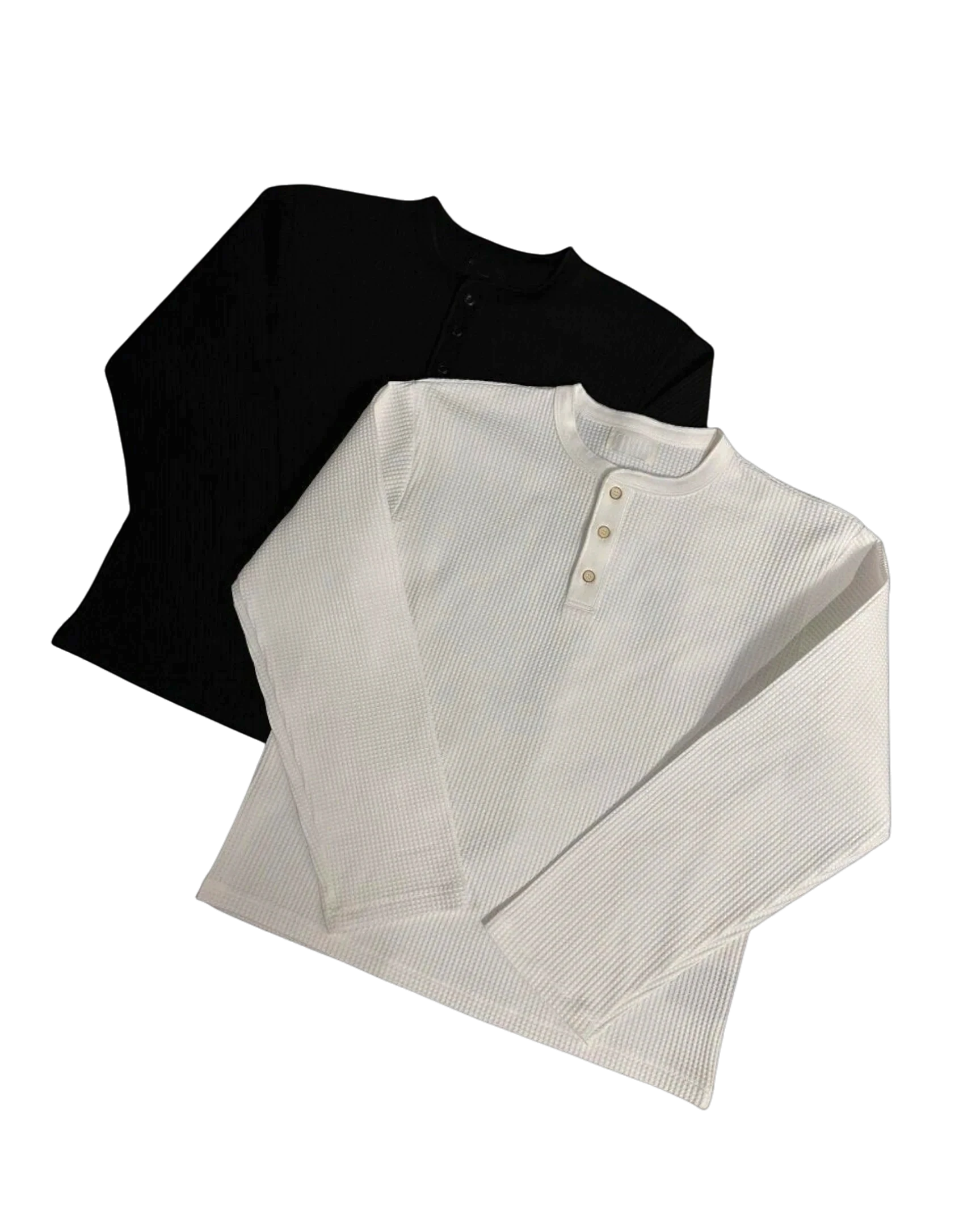 Vicious waffle knit long sleeve henley shirts in black and white with a three-button placket and relaxed fit.