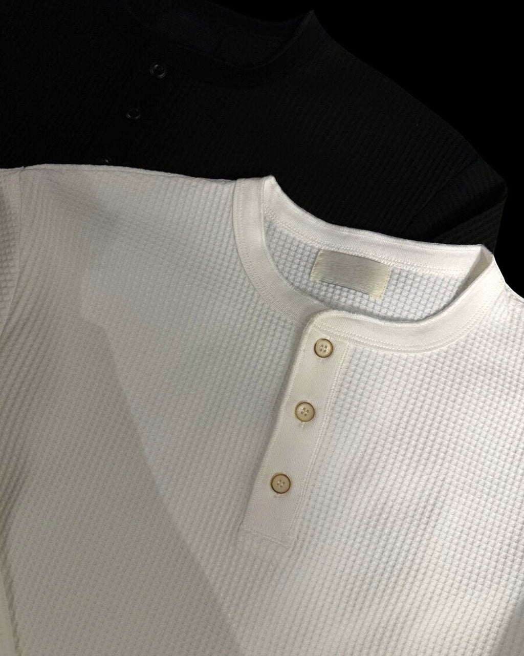 Vicious waffle knit long sleeve henley shirts in white and black with button plackets and cleanfit design