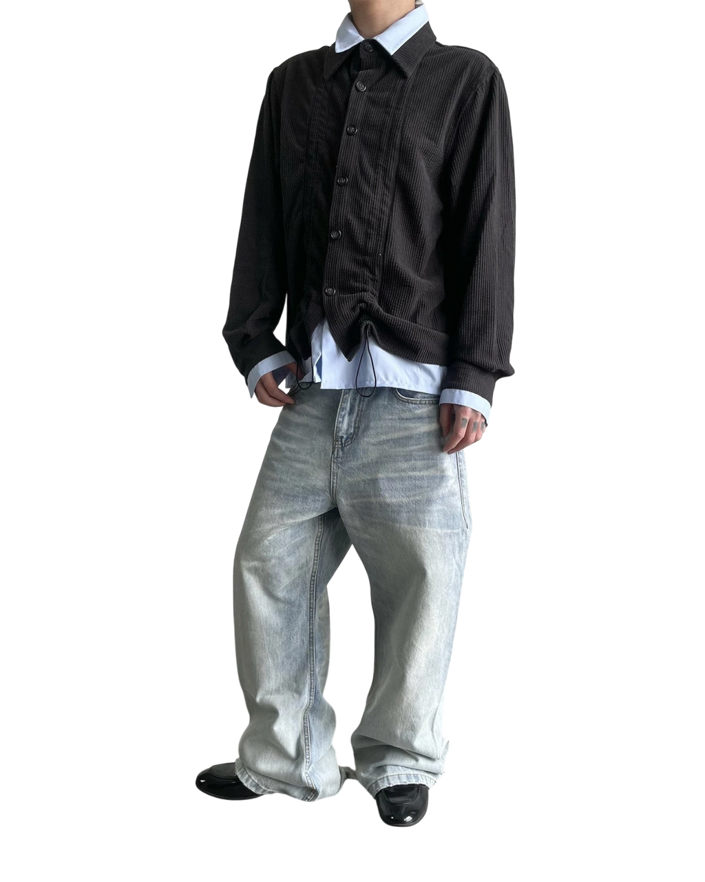 Vicious NIETPXFO washed ice blue vintage wide-leg jeans with cat whisker detailing worn with a black corduroy shirt
