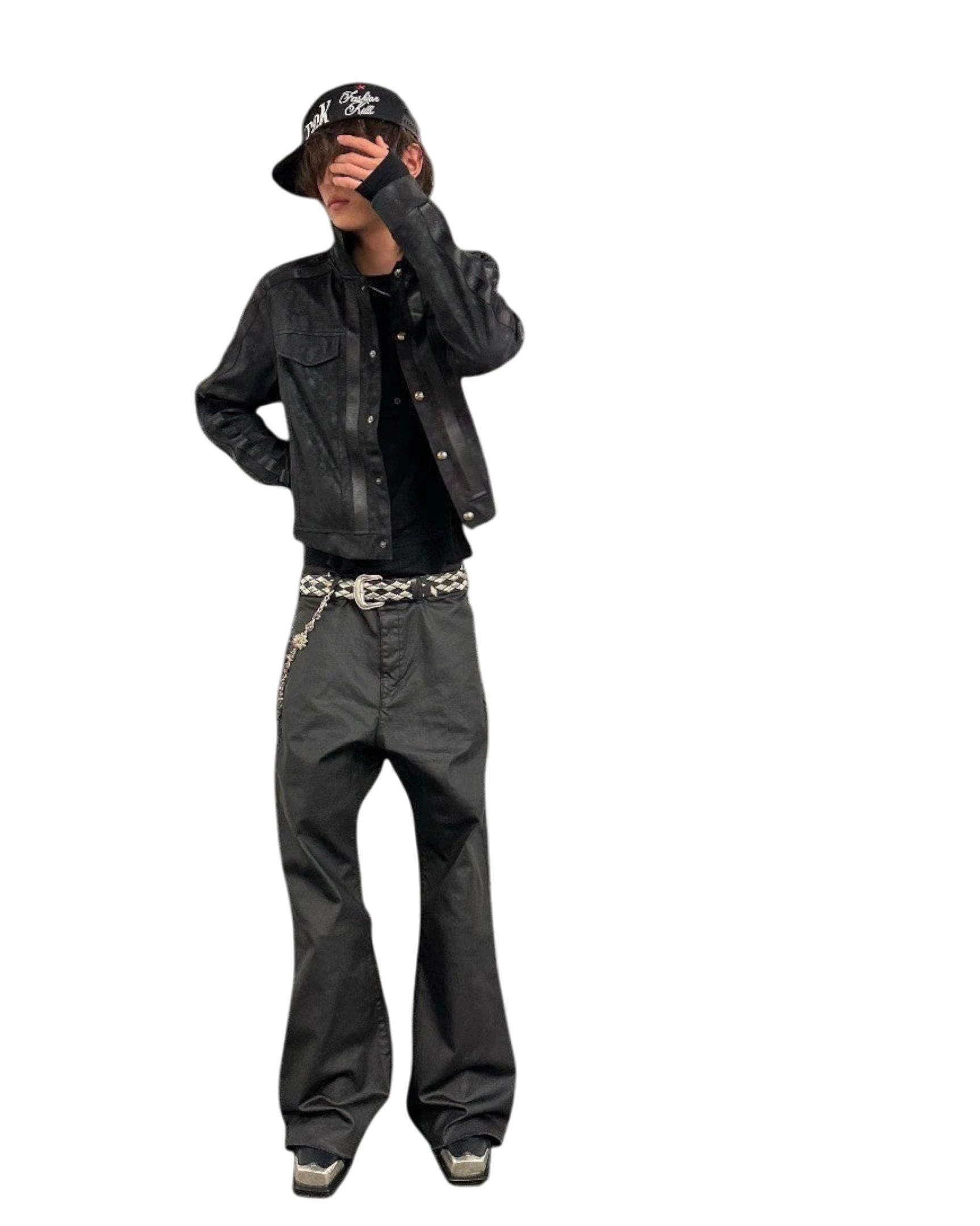Vicious waxed trucker jacket in black with a boxy fit, silver snap buttons, and vertical stripe details on a model.